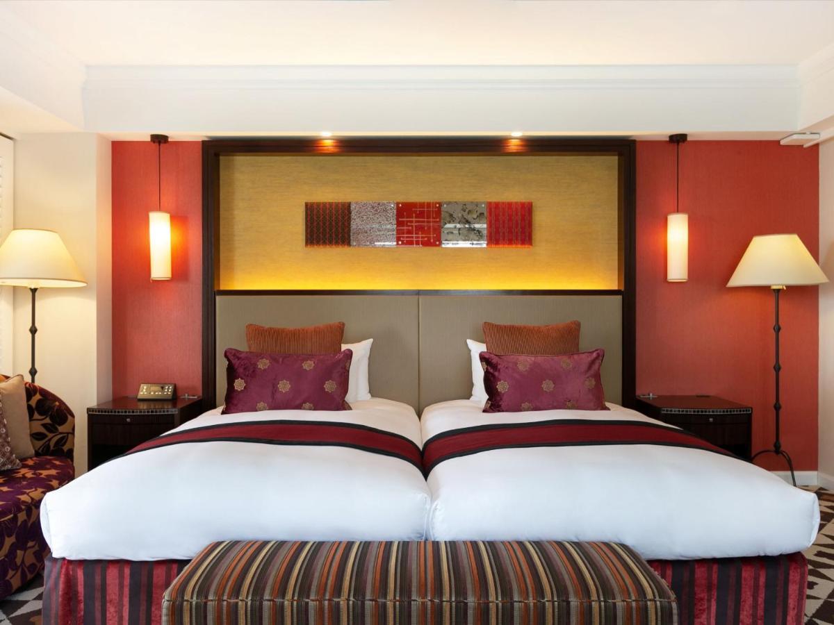 Hotel Nikko Alivila Йомитан Екстериор снимка A bedroom at the hotel