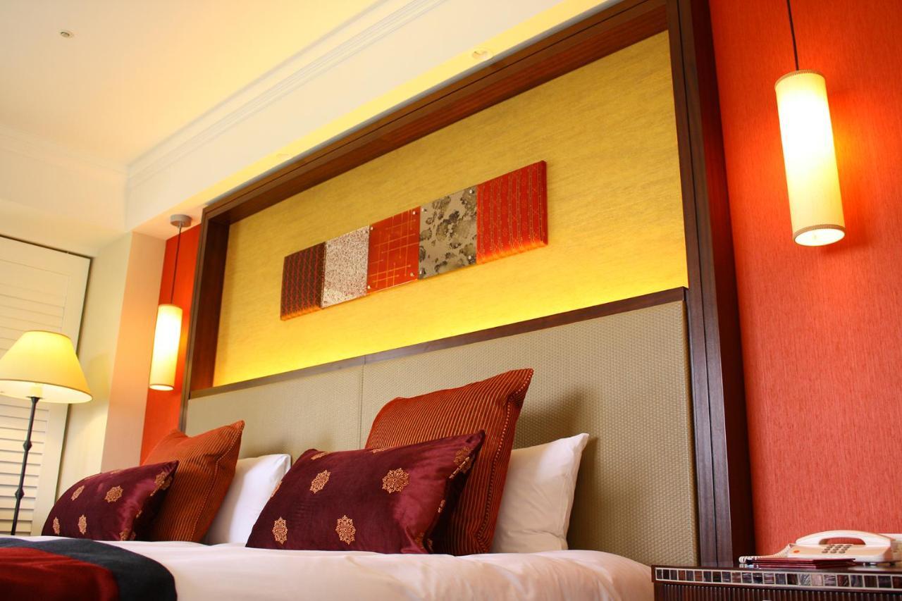 Hotel Nikko Alivila Йомитан Екстериор снимка A room at the hotel